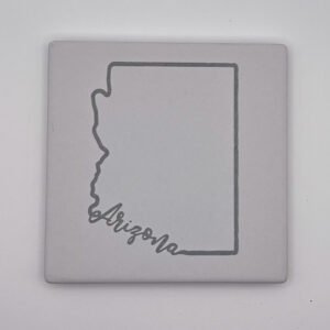 White ceramic coasters with black engraving of whatever item you want.